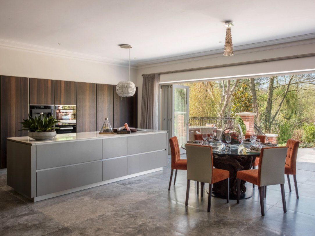 Kitchen and dining room opening onto a garden